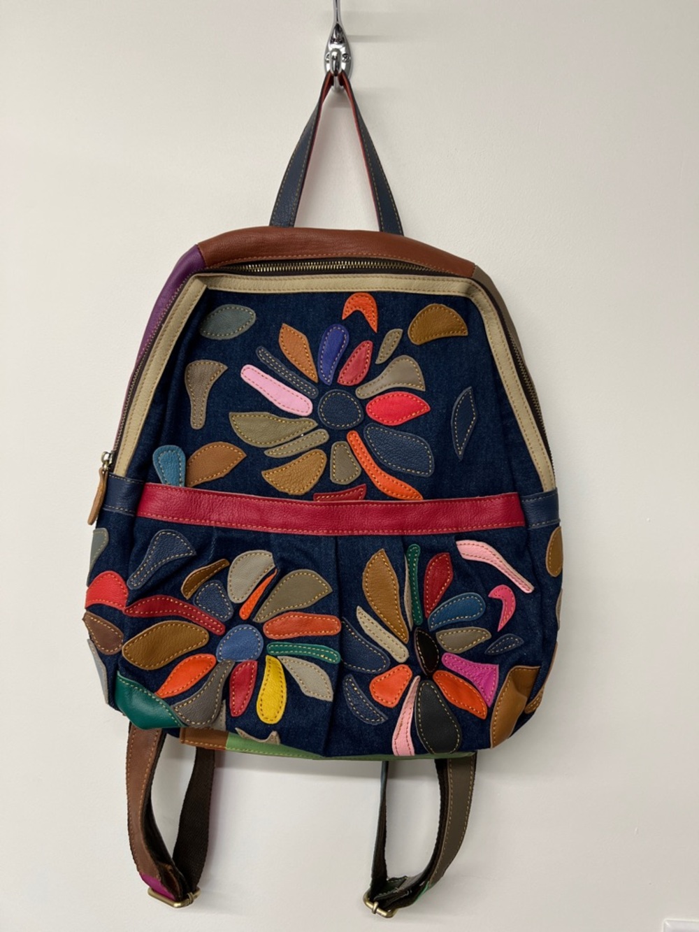 Amerileather Multicolor Floral Appliqué Denim Backpack.